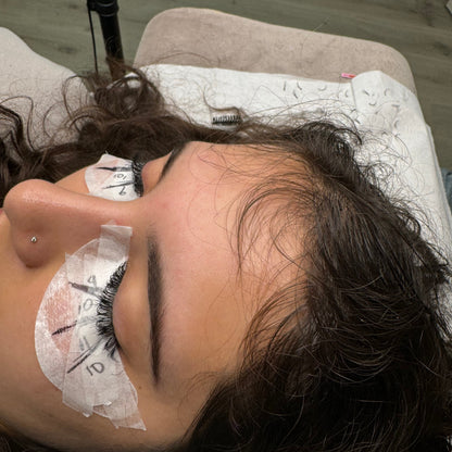 Student applying handmade volume lash fans during 1-to-1 lash training in Reading